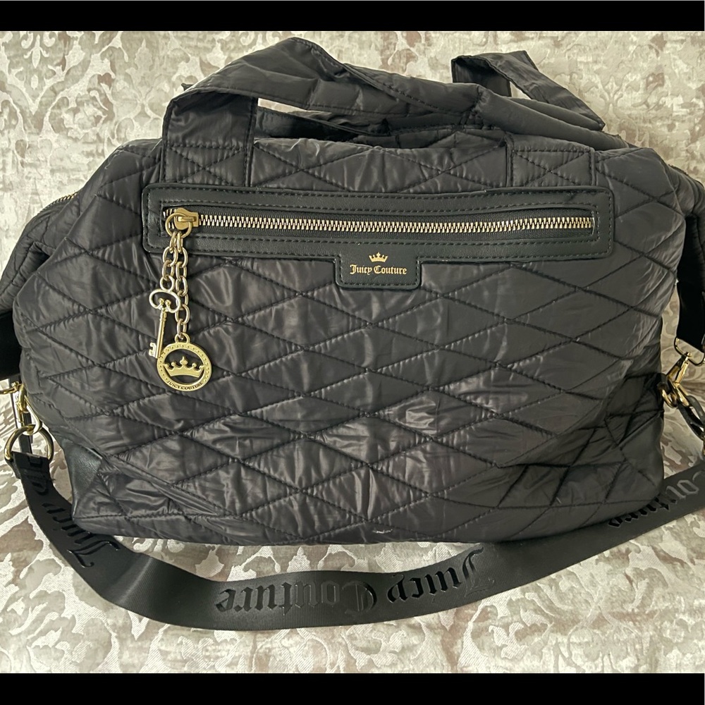 Black Juicy Couture over night bag. In perfect condition.